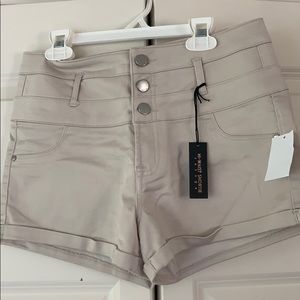 Khaki colored high rise jeans